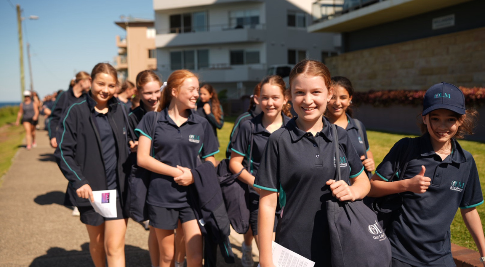A photo showing students from Sydney Catholic Schools in the Shire walking together in faith